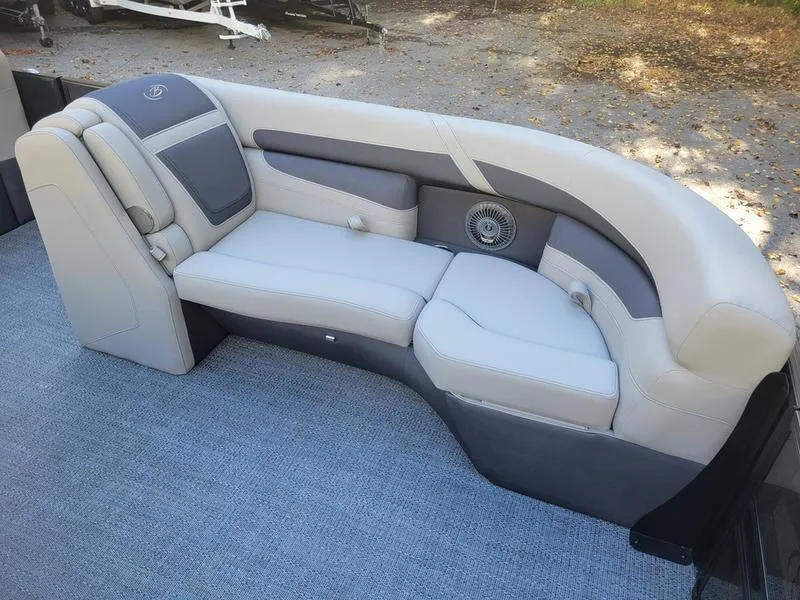 Slide: The Image of 2025 Barletta C22Q boat interior with plush seating and modern design. - 10