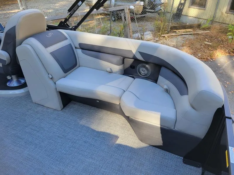 Slide: The Image of 2025 Barletta C22Q boat interior with plush seating and modern design. - 15