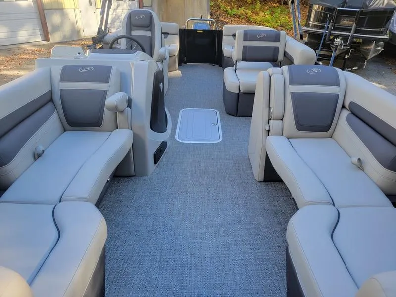 Slide: The Image of 2025 Barletta C22Q pontoon boat interior with spacious seating and modern design. - 19