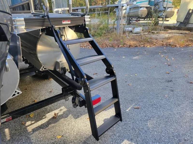 Slide: The Image of 2025 Barletta C22Q pontoon boat with a sturdy boarding ladder. - 7