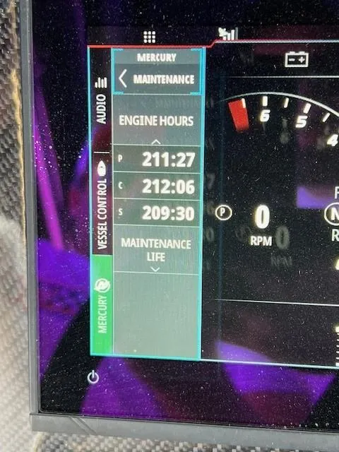Slide: The Image of Fountain 39 NX 2022 dashboard displaying engine hours and maintenance information. - 16