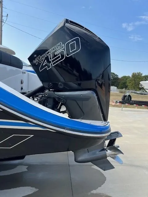 Slide: The Image of 2022 Fountain 39 NX boat with Racing 450 engine, docked outdoors. - 6