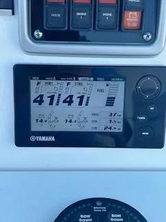 Slide: The Image of Yamaha display on 2015 Everglades 295 Center Console boat dashboard. - 12