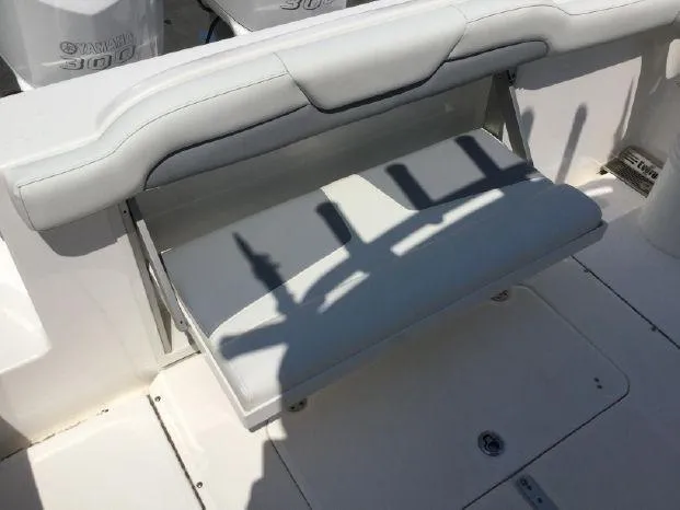 Slide: The Image of 2015 Everglades 295 Center Console boat seat with shadowed details. - 15