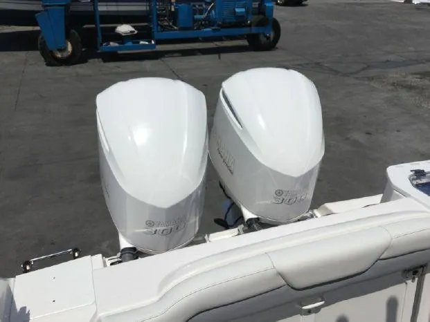 Slide: The Image of Twin Yamaha outboard engines on a 2015 Everglades 295 Center Console boat. - 8