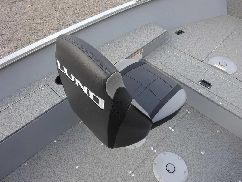 Slide: The Image of 2025 Lund 1600 Fury Heritage Edition boat seat with gray and black upholstery. - 7