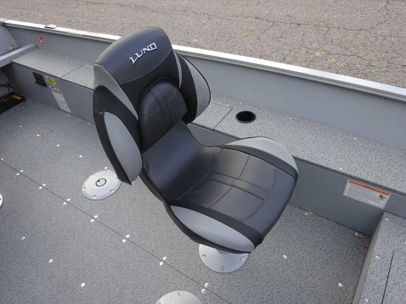 Slide: The Image of 2025 Lund 1600 Fury Heritage Edition boat seat, black and gray design. - 8