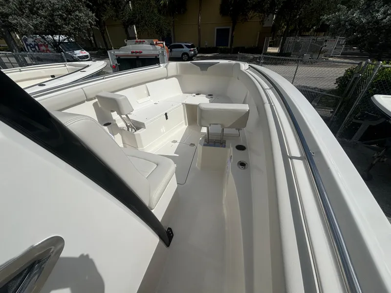 Slide: The Image of 2025 Sailfish 272 CC boat interior with spacious seating and sleek design. - 12