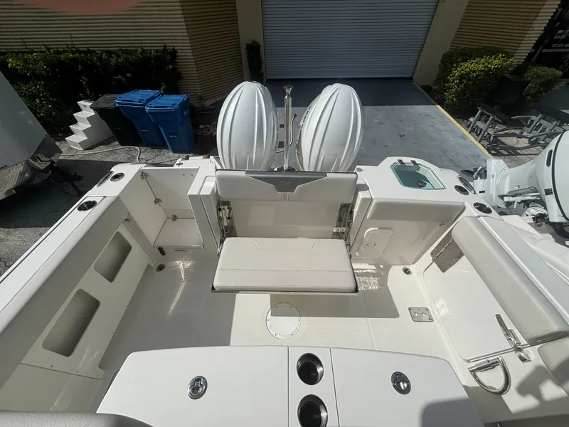 Slide: The Image of 2025 Sailfish 272 CC boat interior with seating and storage compartments. - 5