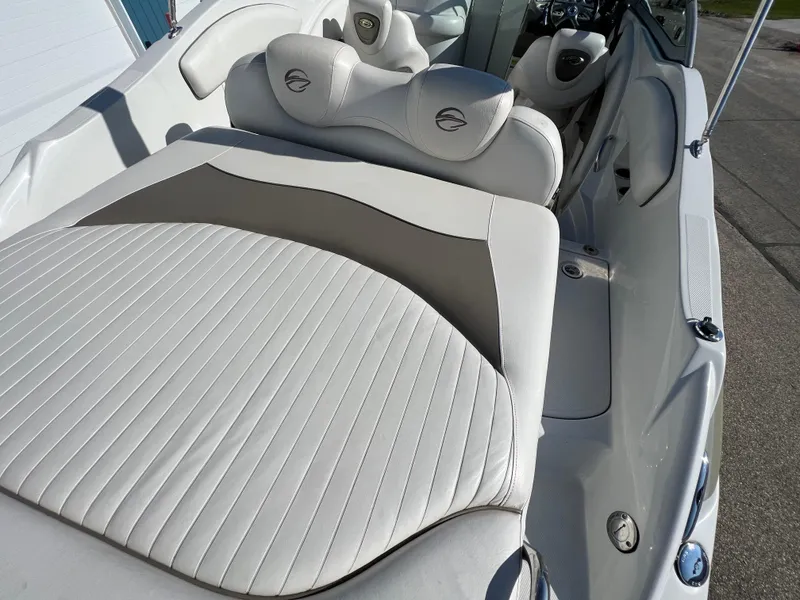 Slide: The Image of 2006 Crownline 260 LS boat interior with white leather seating. - 35
