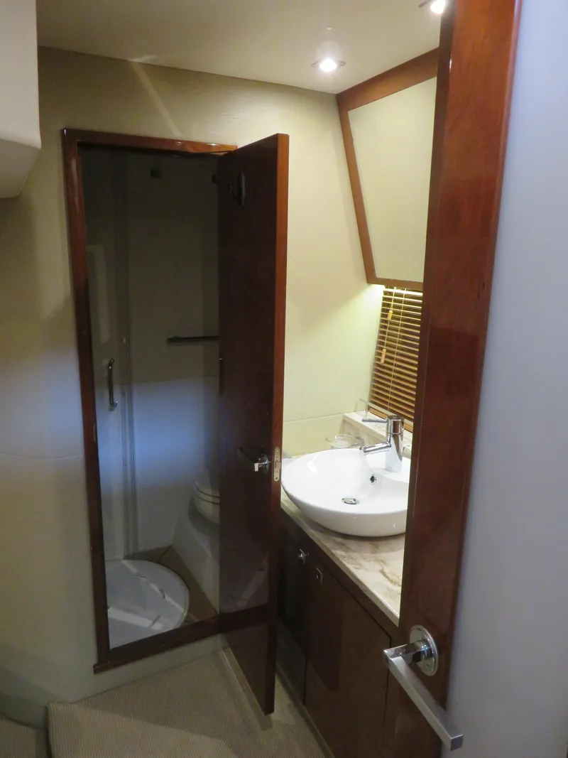 Slide: The Image of Luxurious bathroom in 2015 Sea Ray 470 Sundancer yacht with modern fixtures. - 17