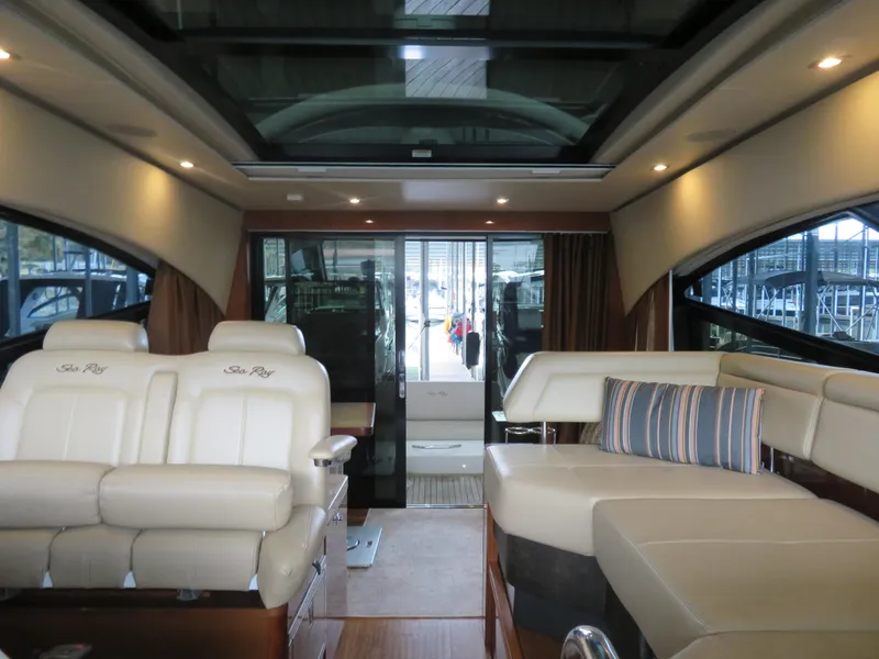 Slide: The Image of Luxurious interior seating of 2015 Sea Ray 470 Sundancer yacht with striped cushions. - 6
