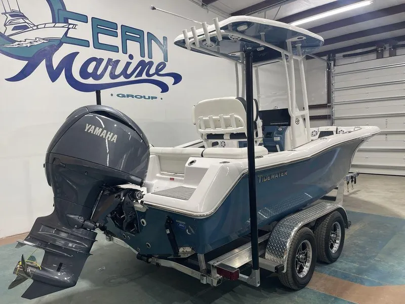 Slide: The Image of 2025 Tidewater 210 LXF boat with Yamaha engine on trailer in showroom. - 3