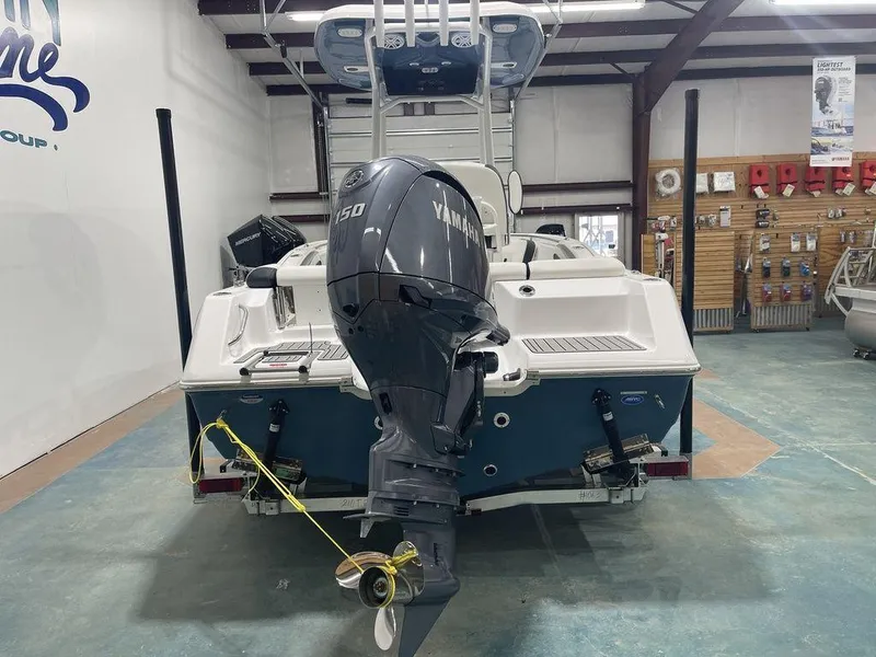 Slide: The Image of 2025 Tidewater 210 LXF boat with Yamaha 150 engine in showroom. - 37