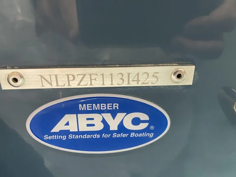 Slide: The Image of Tidewater 210 LXF 2025 boat with ABYC membership plaque and serial number. - 41