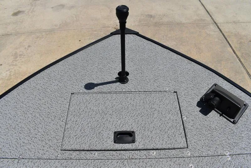 Slide: The Image of Bow of 2025 Lowe SD224 boat with storage hatch and fishing rod holder. - 10