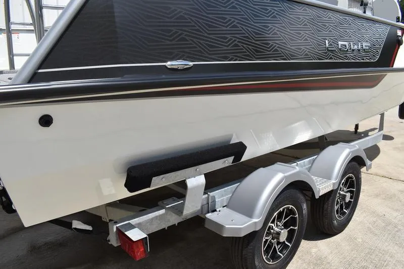 Slide: The Image of 2025 Lowe SD224 boat on trailer, featuring sleek design and modern graphics. - 3