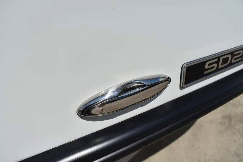 Slide: The Image of Chrome handle and SD224 badge on 2025 Lowe model. - 43
