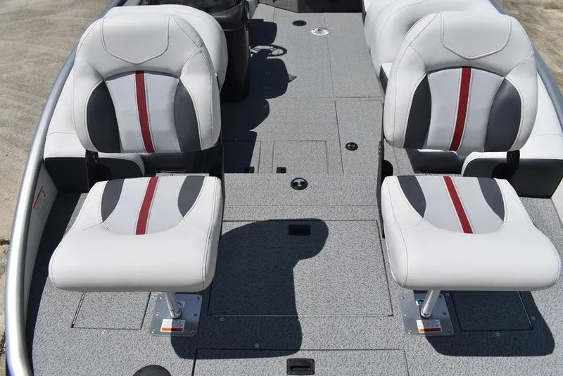 Slide: The Image of 2025 Lowe SD224 boat interior with two gray and red cushioned seats. - 8