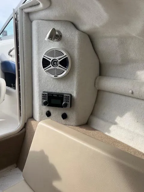 Slide: The Image of Interior of 2013 Chaparral 225 SSi boat with speaker and control panel. - 15