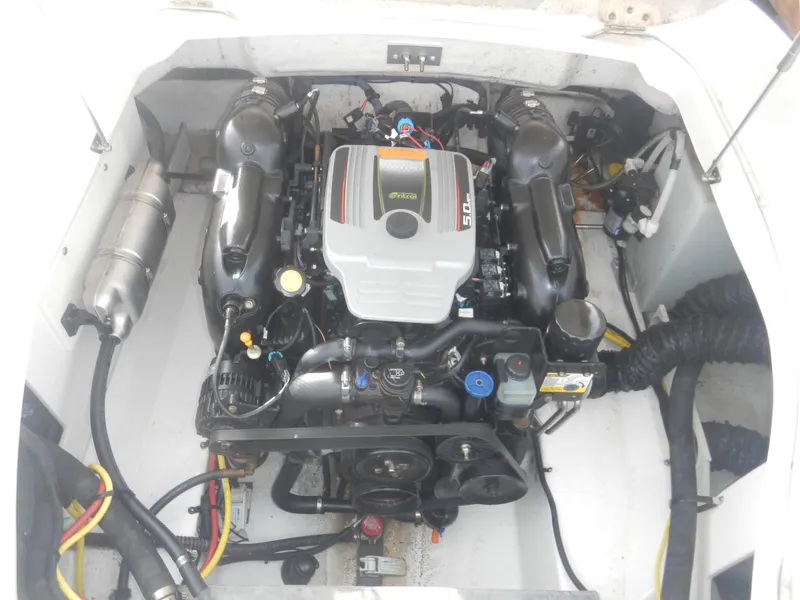Slide: The Image of 2013 Chaparral 225 SSi boat engine compartment, detailed view. - 8