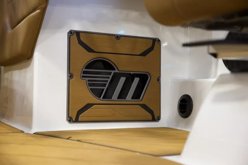 Slide: The Image of 2025 Malibu 26 LSV interior detail with stylish speaker panel. - 20