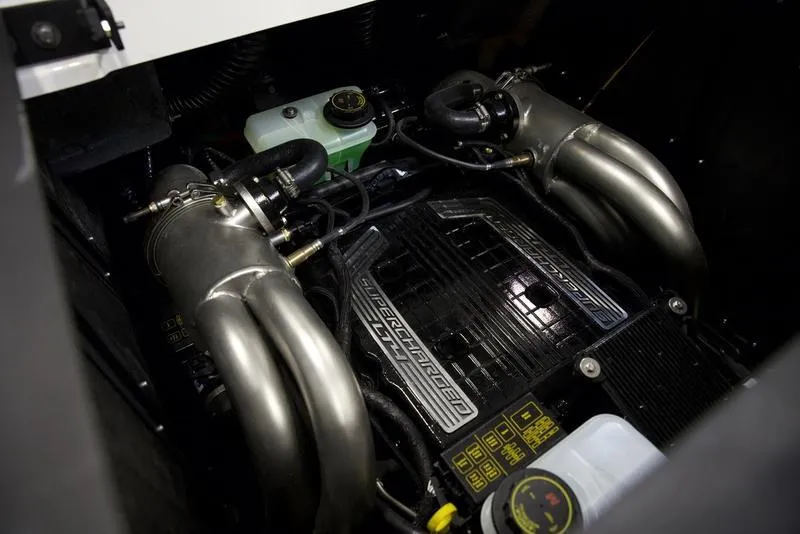 Slide: The Image of 2025 Malibu 26 LSV engine with supercharger, showcasing advanced marine technology. - 3