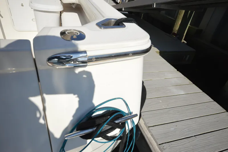 Slide: The Image of 2007 Meridian 490 Pilothouse boat detail with dock and mooring lines. - 11