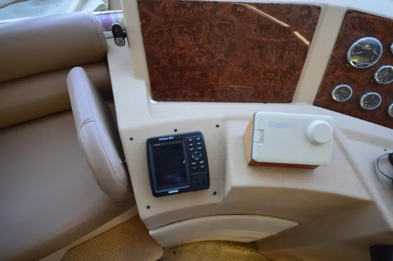 Slide: The Image of 2007 Meridian 490 Pilothouse dashboard with Garmin GPS and Simrad equipment. - 28