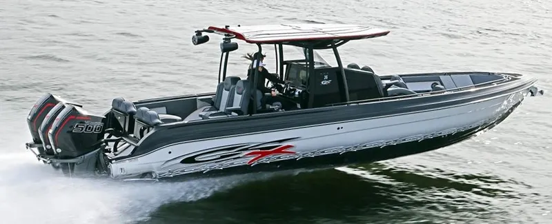 Slide: The Image of 2025 Glasstream GSX 360 LS speedboat cruising on water with powerful engines. - 17