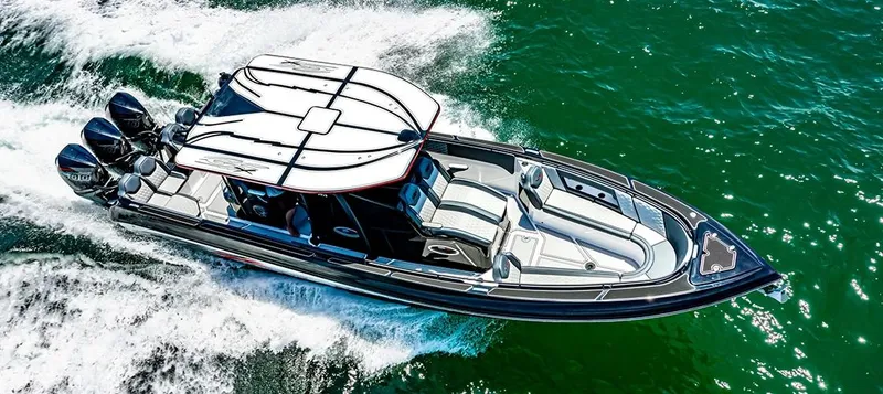 Slide: The Image of 2025 Glasstream GSX 360 LS boat cruising on open water. - 18