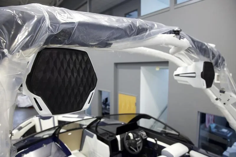 Slide: The Image of 2025 Malibu 25 LSV boat interior with advanced speaker system. - 11