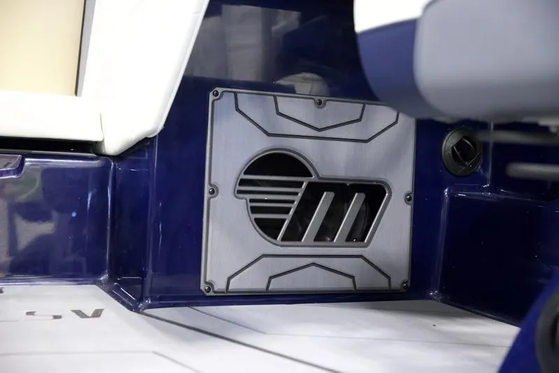 Slide: The Image of 2025 Malibu 25 LSV boat interior detail with logo and sleek design. - 6