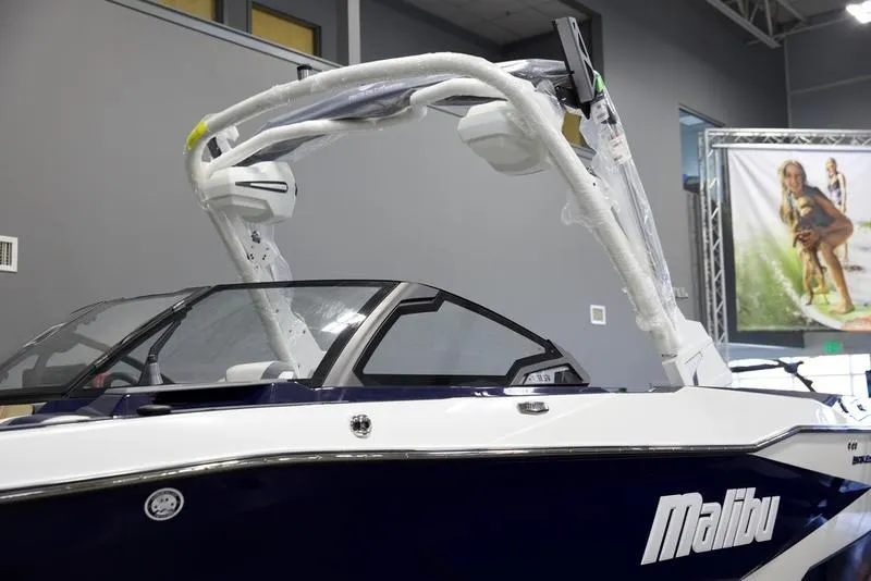 Slide: The Image of 2025 Malibu 25 LSV boat with sleek design and modern features. - 7