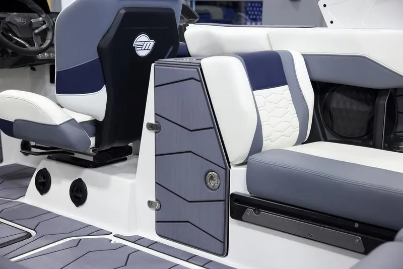 Slide: The Image of 2025 Malibu 24 MXZ interior with modern seating and sleek design. - 29