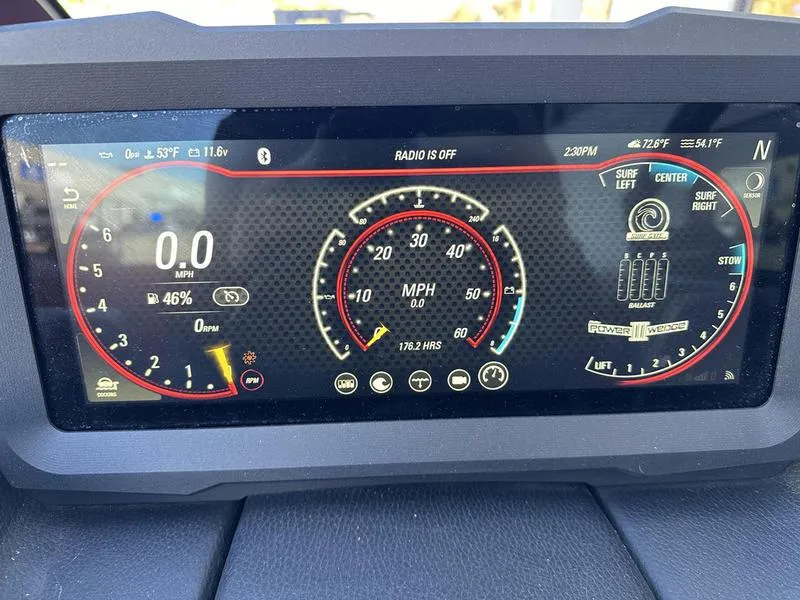 Slide: The Image of 2024 Malibu 23 MXZ dashboard display showing speedometer and control settings. - 11