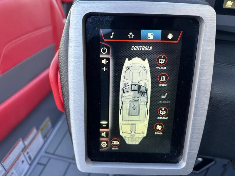 Slide: The Image of Touchscreen control panel in 2024 Malibu 23 MXZ boat, featuring various settings and options. - 16