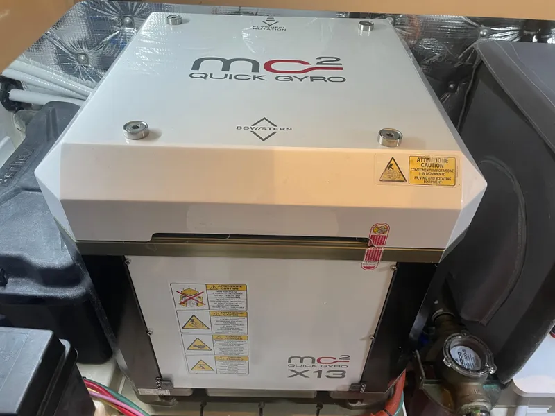 Slide: The Image of MC2 Quick Gyro stabilizer in MJM 4, 2023 model, featuring advanced technology. - 13