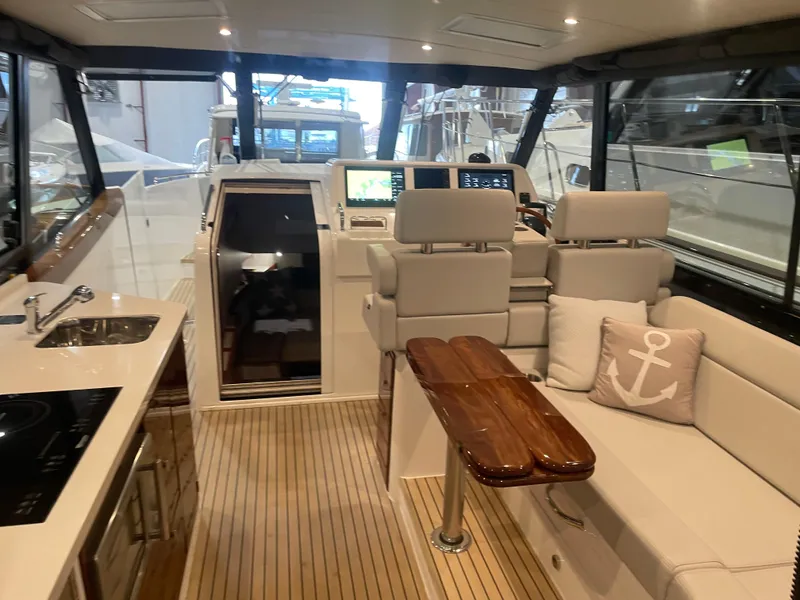 Slide: The Image of Luxurious interior of 2023 MJM 4 yacht with modern seating and navigation equipment. - 14