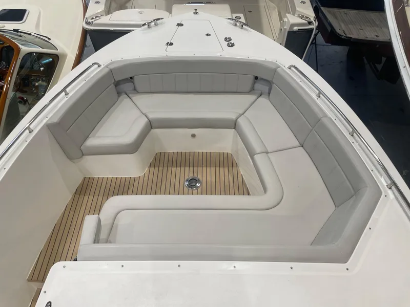 Slide: The Image of 2023 MJM 4 boat with spacious seating and teak flooring. - 17
