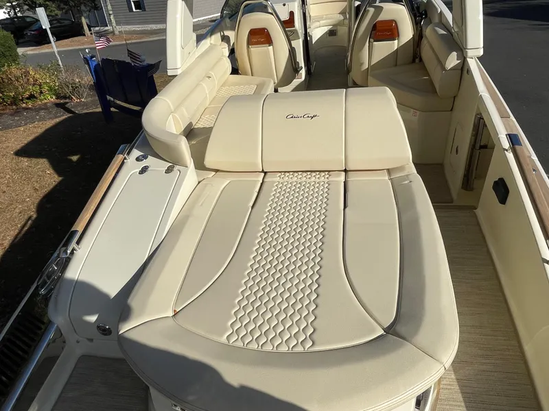 Slide: The Image of Luxurious interior of 2025 Chris-Craft Launch 28GT boat with cream leather seating. - 5