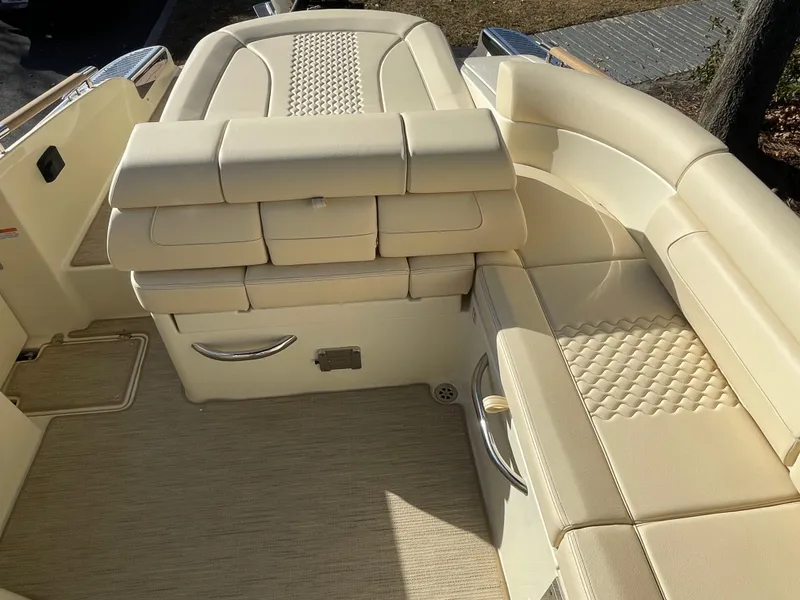 Slide: The Image of Luxurious interior of 2025 Chris-Craft Launch 28GT with cream leather seating. - 6