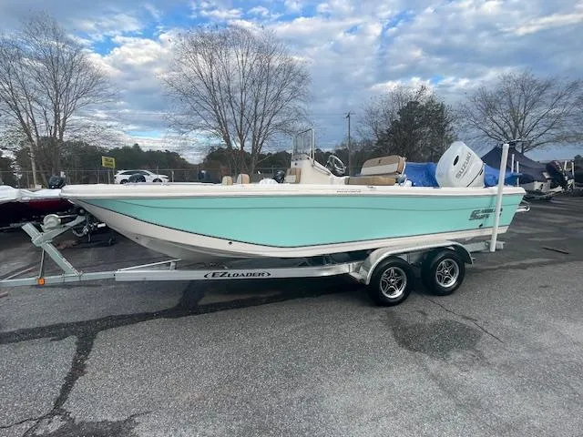 The Image of 2023 Carolina Skiff 21 Ultra Elite boat on trailer, parked outdoors. - 0