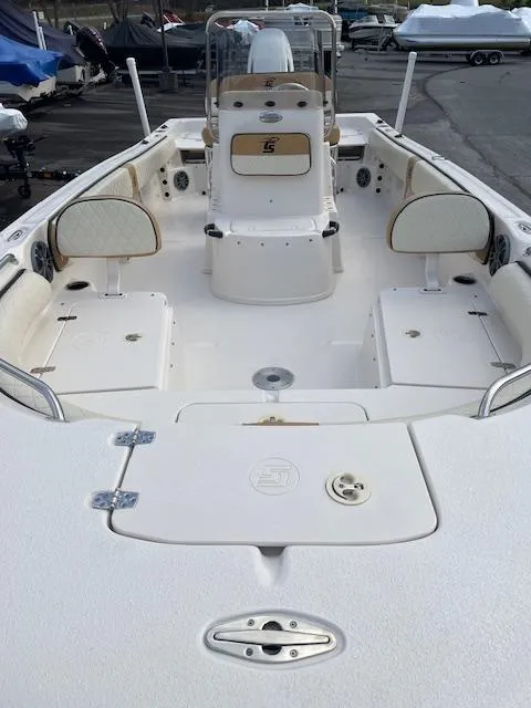 Slide: The Image of 2023 Carolina Skiff 21 Ultra Elite boat interior, spacious seating, and storage compartments. - 4