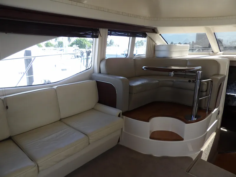 Slide: The Image of Luxurious interior of 2008 Sea Ray 44 Sedan Bridge yacht with plush seating. - 14