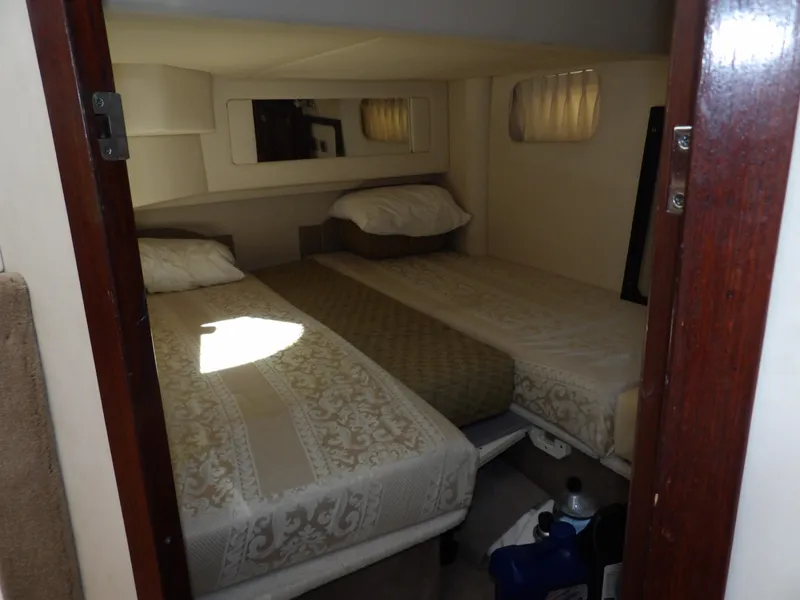 Slide: The Image of Interior cabin of 2008 Sea Ray 44 Sedan Bridge with twin beds. - 36