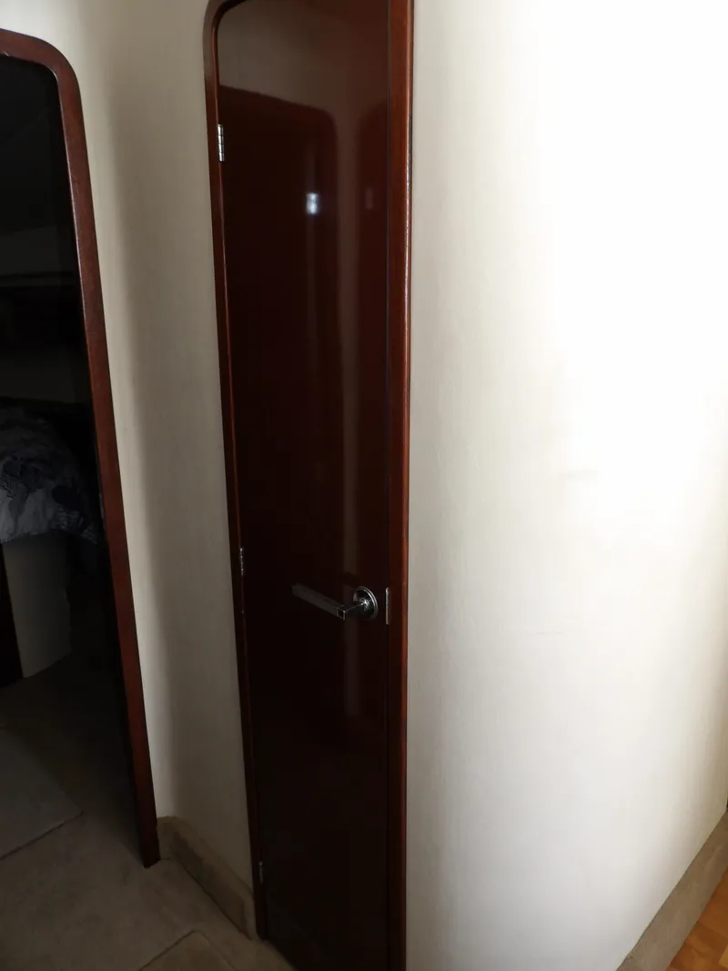 Slide: The Image of Wooden interior door on 2008 Sea Ray 44 Sedan Bridge yacht. - 38