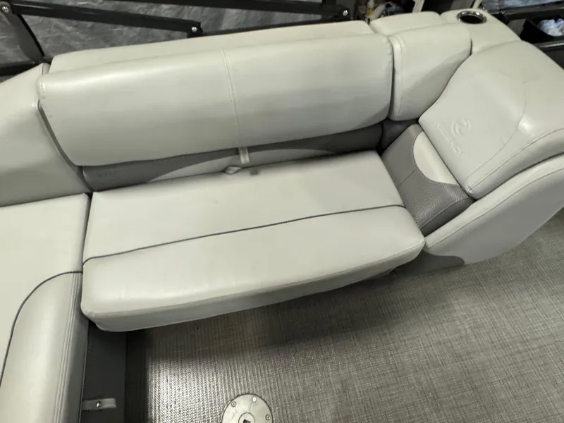 Slide: The Image of 2019 Regency 250 DL3 boat interior with gray cushioned seating. - 15