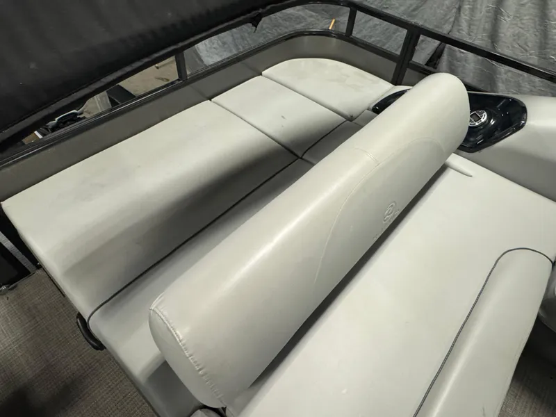 Slide: The Image of 2019 Regency 250 DL3 boat interior with gray seating and sleek design. - 17