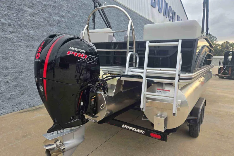 Slide: The Image of 2025 Lowe SS 230 WV pontoon boat with Mercury Pro XS engine on trailer. - 10